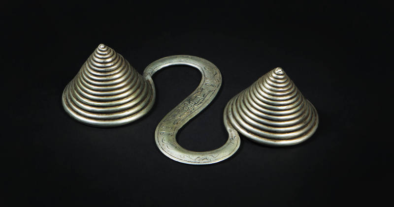 S-Shaped Counterweight, 20th Century
Miao culture; Guizhou Province, China
Silver; 6 1/8 × 4 …