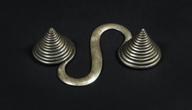 S-Shaped Counterweight, 20th Century
Dong or Miao culture; Guizhou Province, China
Silver; 5 …