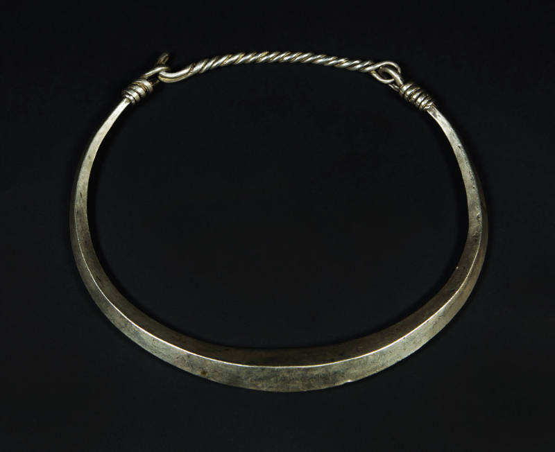 Neck Ring with Coiled Accent, 20th Century
Miao culture; Guizhou Province, China
Silver; 6 1/…