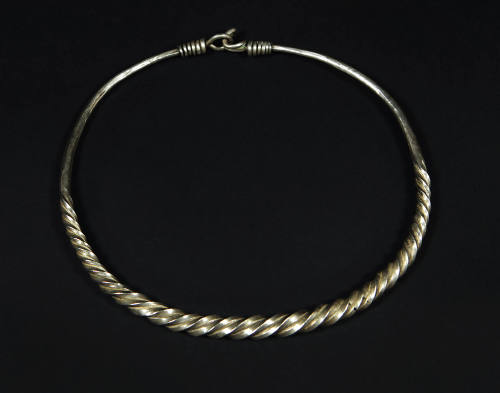 Neck Ring with Twisted Bands, 20th Century
Miao culture; Guizhou Province
Silver; 5 1/2 × 5 7…