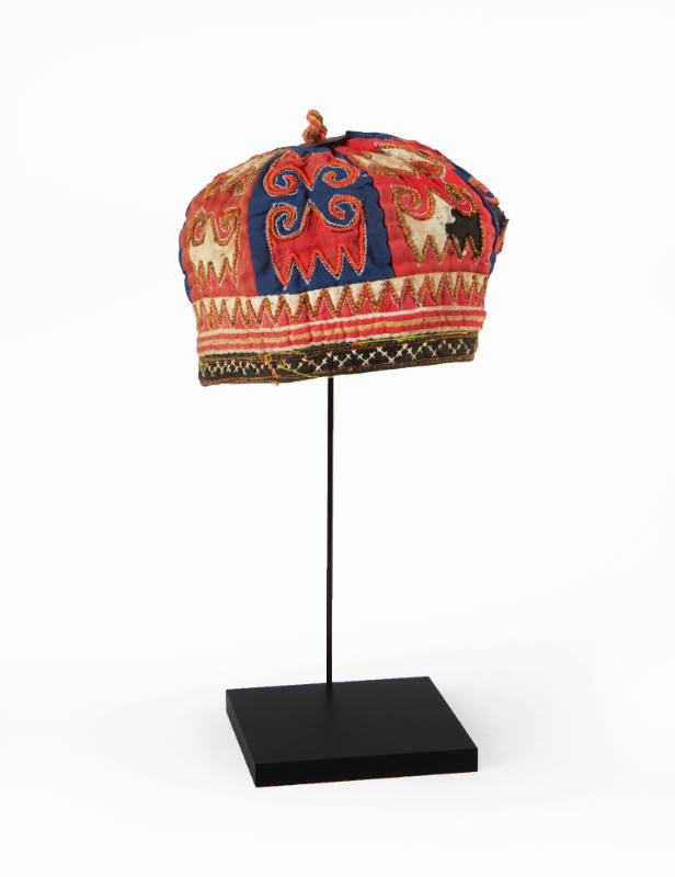 Hat, 1990-2003
Miao culture; Guizhou Province, China
Cotton, possibly silk and metal; 5 × 5 1…