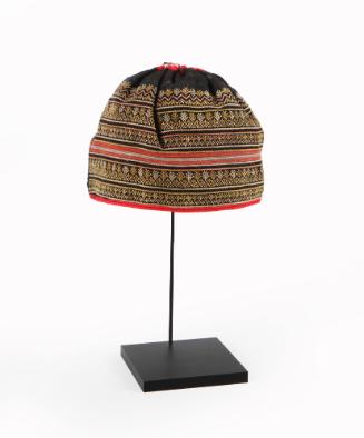 Hat, 20th century
Hmong culture; Vietnam
Cotton and silk; 5 × 7 × 7 in.
2017.4.21
Gift of J…