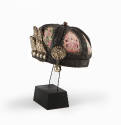 Hat, 20th Century
Miao culture; probably Guizhou Province, China
Cotton, silk and silver; 4 3…