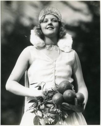 Dorothy Reynolds Posing with Oranges, 1920s
Edward W. Cochems (American, 1874-1949); Orange Co…
