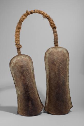 Bell-Iron Currency (Ngke), 19th Century
Yoruba culture; Nigeria
Iron and fibrous rope; 32 1/8…
