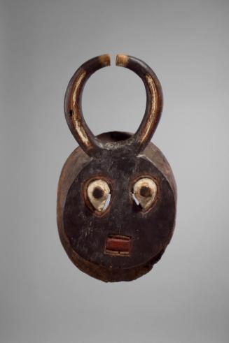 Baule Goli Kplekple Mask, 20th Century
Baule culture; Akan Region, Ivory Coast
Wood and pigme…