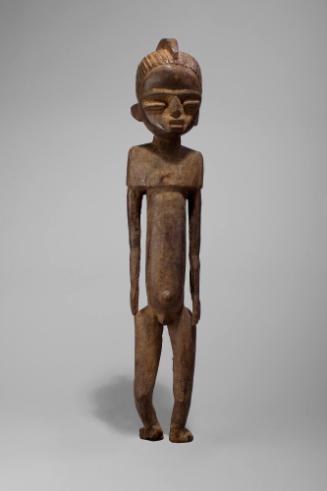 Bateba Phuwe Figure, 20th Century
Lobi culture; Ghana
Wood; 30 1/2 x 5 1/2 x 4 7/8 in.
96.72…