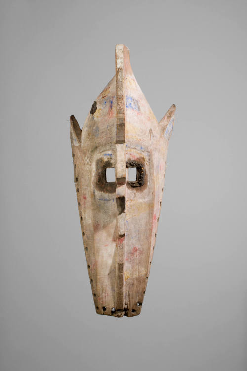 Mask, 20th Century
Bobo people; Burkina Faso
Wood and seed; 24 x 11 x 11 1/4 in.
F75.5.9
Gi…