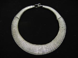 Necklace, 20th Century
Miao culture; probably Guizhou Province, China
Silver; 11 x 10 in.
20…