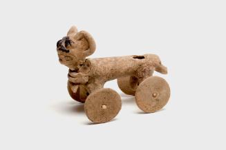 Wheeled Jaguar Effigy, c. 550-800 A.D.
Veracruz, Mexico
Ceramic and wood; 3 5/8 x 2 1/2 x 4 3…