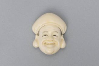Netsuke of a Face, 19th to 20th Century
Japan
Ivory and pigment; 1 7/8 x 1 7/8 in.
2005.9.42…