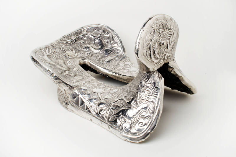 Saddle with Embossed Motifs, 20th Century
Miao people; Guizhou Province, China
Silver; 10 1/2…