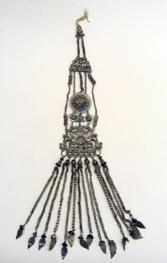 Ornament, 20th Century
Miao culture; Guizhou Province, China
Silver and gemstones; 3 1/2 × 16…