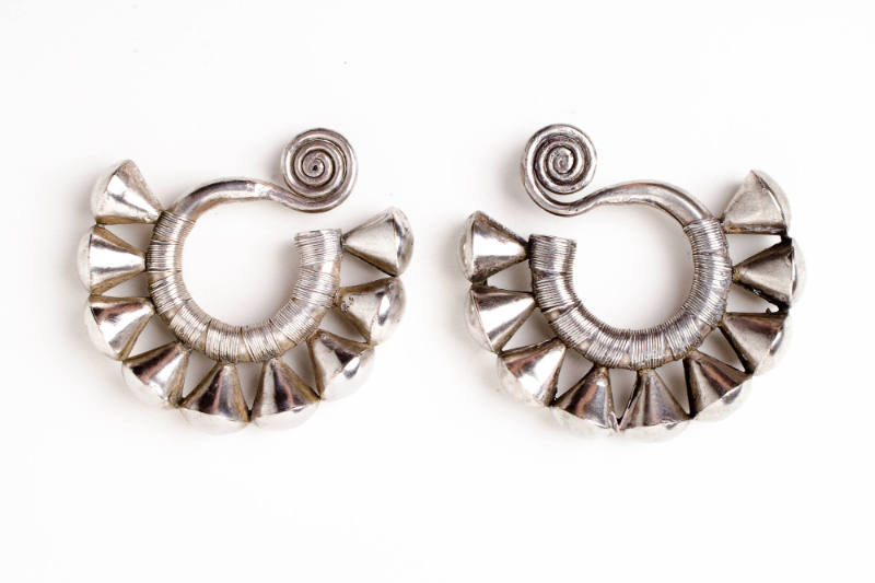 Earrings, 20th Century
Dong culture; Guizhou Province, China
Silver; 3 3/4 x 3 1/2 in.
2001.…