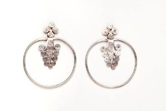 Silver Earrings, 20th Century
Miao culture; Guizhou Province, China
Silver; 7/8 x 2 3/8 in.
…