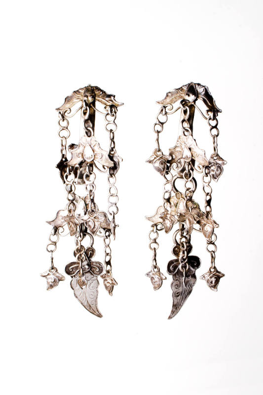 Dangle Hoop Earrings, 20th Century
Dong culture; Guizhou Province, China
Silver; 3 1/2 x 1 in…