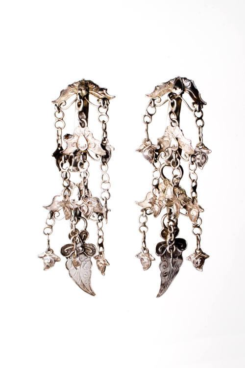 Dangle Hoop Earrings, 20th Century
Dong culture; Guizhou Province, China
Silver; 3 1/2 x 1 in…