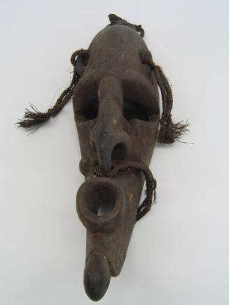 Mask, 20th Century
East Sepik Province, Papua New Guinea, Melanesia
Wood, fiber and tassels; …