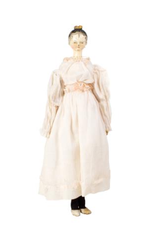 Tuck-Comb Doll, c. 1830
Germany
Wood, organdy, wire, silk and hair; 15 1/2 × 5 1/2 × 3 in.
8…