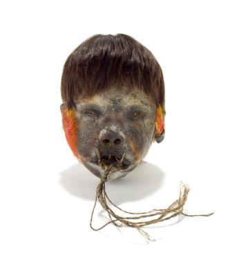 Shrunken Head (Tsantsa), early 20th Century
Shuar people; Ecuador
Human head, feather and fib…