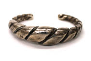 Bracelet with Incised Coil, 20th Century
Miao culture; Guizhou Province, China
Silver; 1/4 × …