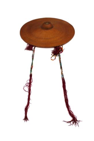 Hat, 20th Century
probably Miao culture; China
Wicker, string and ceramic; 2 1/2 × 15 3/4 in.…