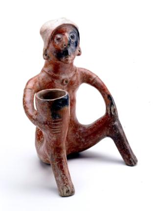 Seated Figure with Jar on Knee, 200 BCE - 400 CE
Colima Shaft Tomb peoples; Colima, Mexico 
C…