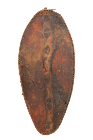 Shield, mid 20th Century
Maasai culture; Kenya
Leather, wood and pigment; 42 × 18 1/4 × 4 in.…