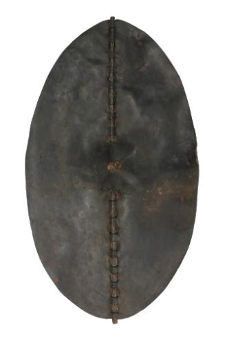 Shield, late 19th Century
probably Sukuma culture; Tanzania 
Leather and wood; 46 7/8 × 26 × …