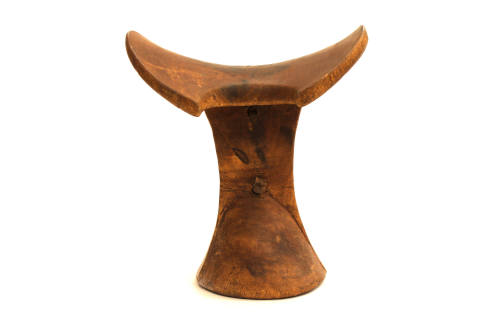 Headrest, 20th Century
probably Turkana culture; Kenya
Wood and leather; 8 × 7 1/4 × 5 1/8 in…