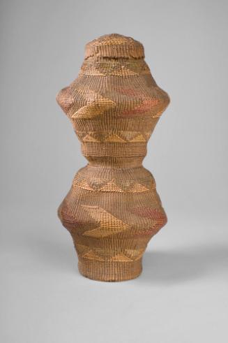 Rattle, c. 1880
Tlingit culture; Sitka, Alaska
Spruce root and dyed grass; 10 3/4 × 4 in.
44…