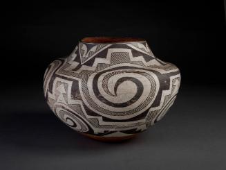 Olla, early 20th Century
Acoma culture; New Mexico
Clay and pigment; 10 3/8 x 13 1/4 in. 
30…