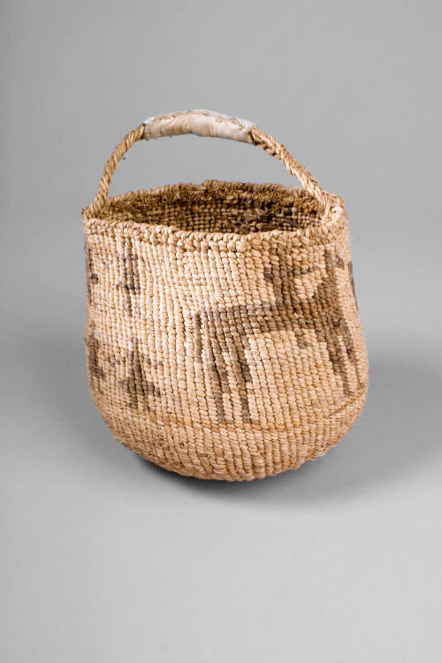 Basket with Handle, unknown date
Wasco people; Oregon
Native grasses and leather; 5 x 5 1/2 i…