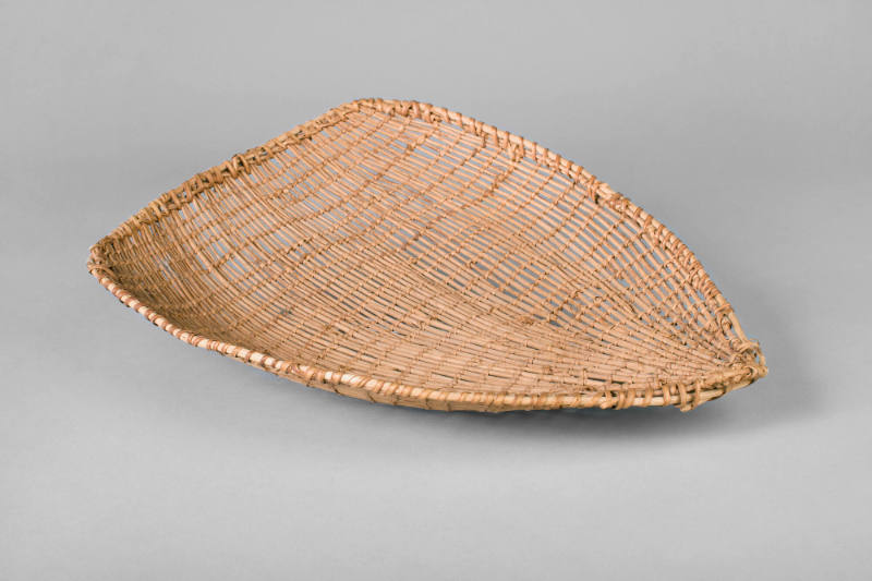 Winnowing Basketry Tray, unknown date
Paiute people; California
Redbud twigs and willow; 3 1/…