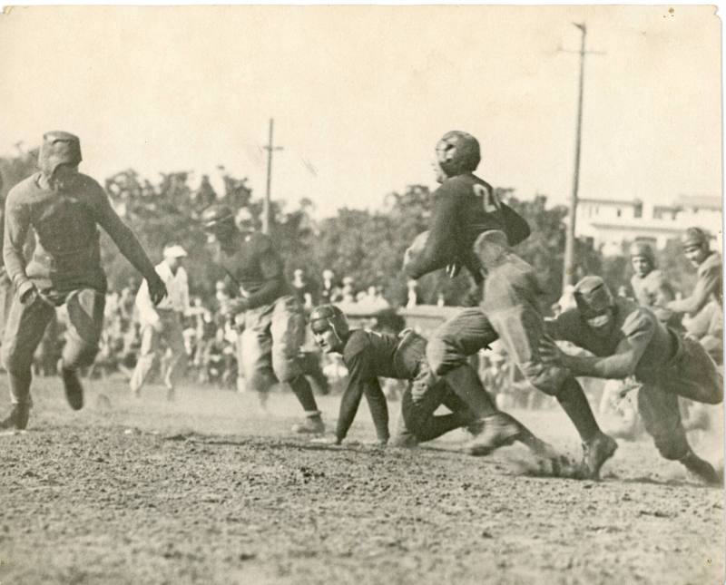 Football Players Mid-Tackle, early 20th Century
Leo Tiede (American, 1889 - 1968); Orange Coun…