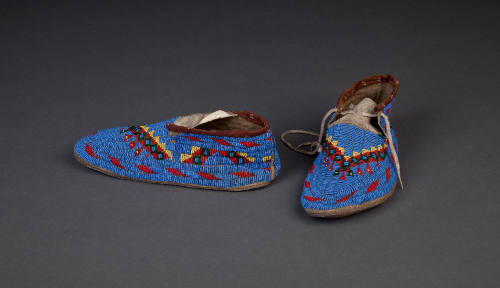 Moccasins, c. 1880
Cree culture; Yukon, Canada
Glass bead, cow rawhide, tanned deer leather a…