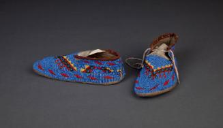 Moccasins, c. 1880
Cree culture; Yukon, Canada
Glass bead, cow rawhide, tanned deer leather a…