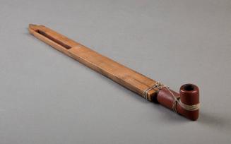 Pipe, c. 1870
Cheyenne people; North America
Mountain ash wood, catlinite, tanned deerskin le…