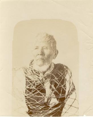 Elderly Native American Man Wrapped in Net, unknown date
Unknown photographer
Paper; 6 5/8 x …