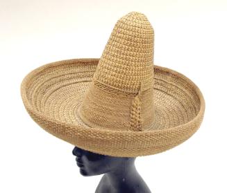 Sombrero, c. 1900
Unknown Maker; Mexico
Straw; 10 1/2 x 38 1/2 in.
F78.44.3c
Bowers Museum …