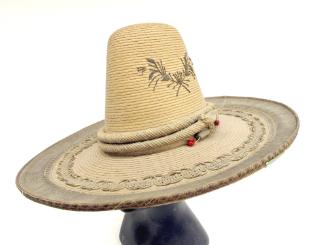 Sombrero, c. 1900
Unknown Maker; Mexico
Straw, cotton and sequins; 8 3/8 x 20 x 18 x 23 in.
…