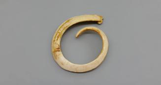 Bracelet, early to mid 20th Century
Papua New Guinea, Melanesia
Boar tusk; 5 × 4 1/4 × 3/4 in…