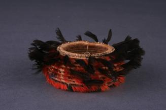 Basket, c. 1920
Pomo culture; Northern California
Willow, woodpecker and California quail fea…