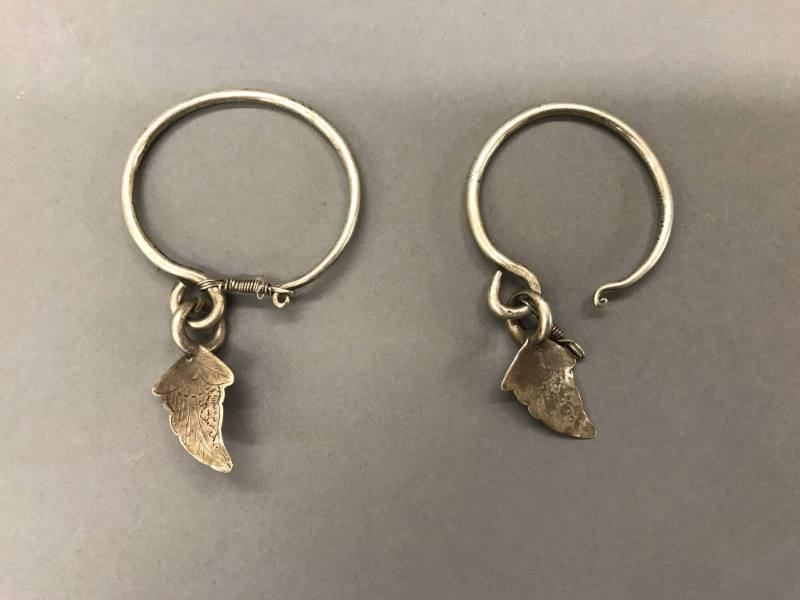 Earrings, 20th Century
Miao culture; probably Guizhou Province, China
Silver; 2 x 3 1/2 in.
…