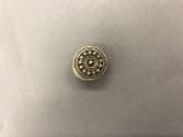 Ear Spool, 20th Century
Miao culture; probably Guizhou Province, China
Silver; 3/4 in.
2001.…
