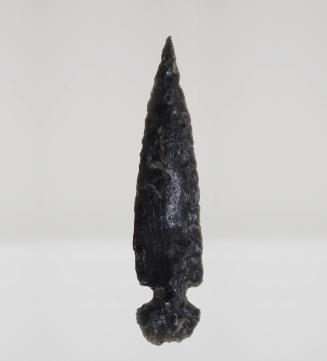 Projectile Point, 300-1519
West Mexico
Obsidian; 3/4 x 3 3/8 in.
2003.10.42G
Anonymous Gift