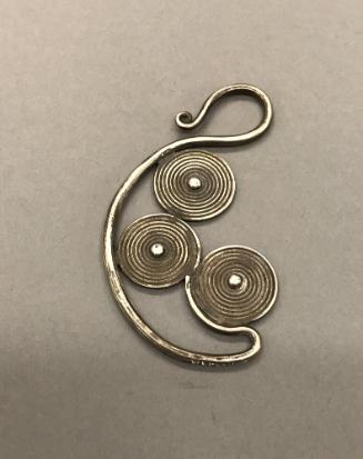 Earring, 20th Century
Miao culture; probably Guizhou Province, China
Silver; 1 3/4 x 3 in.
2…