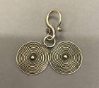 Earring, 20th Century
Miao culture; probably Guizhou Province, China
Silver; 3 x 3 in.
2001.…