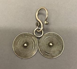 Earring, 20th Century
Miao culture; probably Guizhou Province, China
Silver; 3 x 3 in.
2001.…