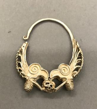 Earring, 20th Century
Miao culture; probably Guizhou Province, China
Silver; 1 1/2 x 1 3/4 in…
